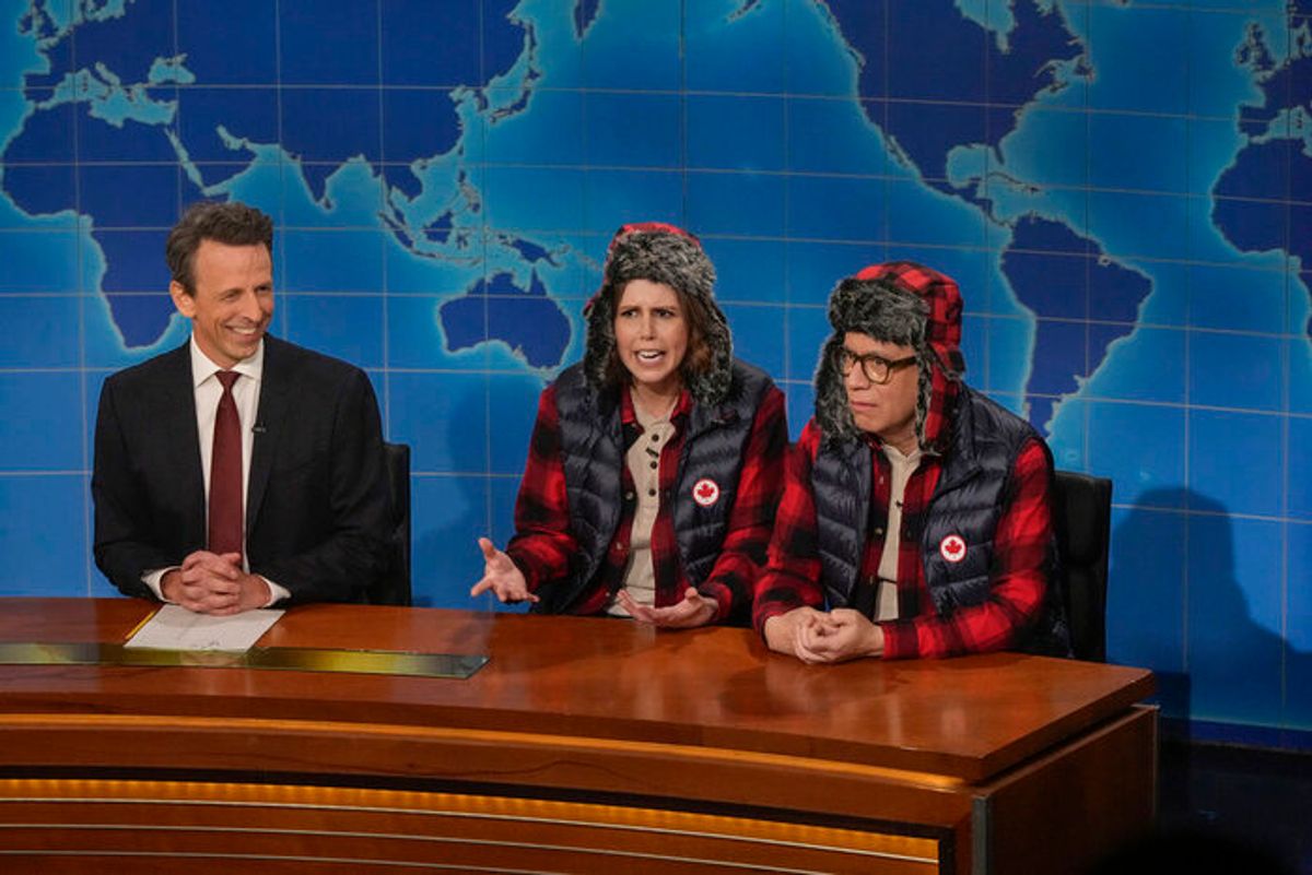 Seth Meyers, Vanessa Bayer, and Fred Armisen at 