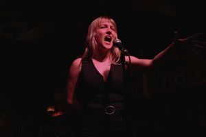 For her performance, Erin McMillen turns into Michael in the Bathroom, from Be More C Photo