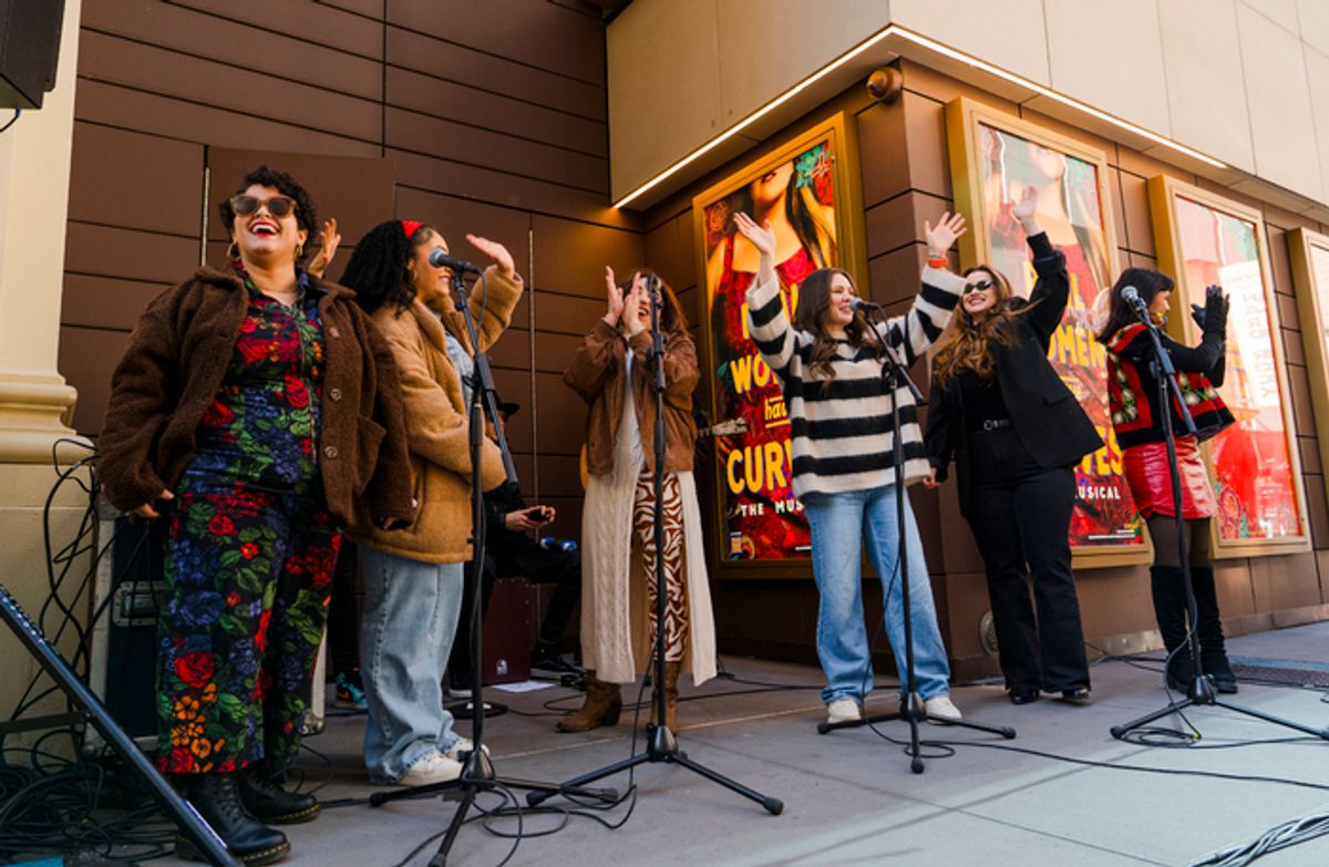 Joy Huerta and cast members at 