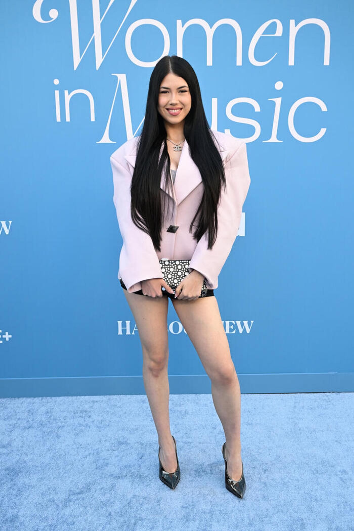 Photos: Doechii, Laverne Cox, Meghan Trainor, & More Attend Billboard Women in Music 2025  Image