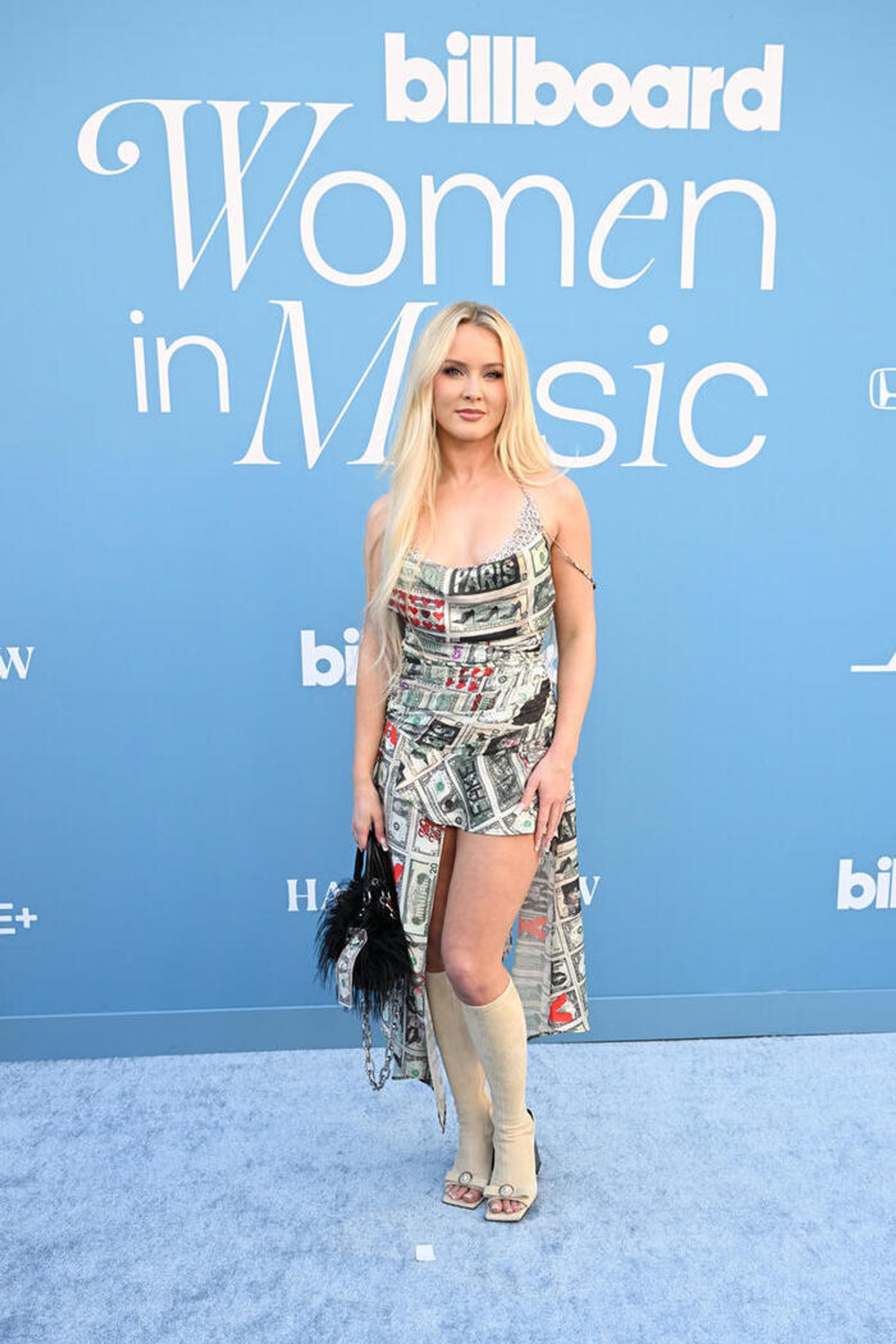 Photos: Doechii, Laverne Cox, Meghan Trainor, & More Attend Billboard Women in Music 2025  Image