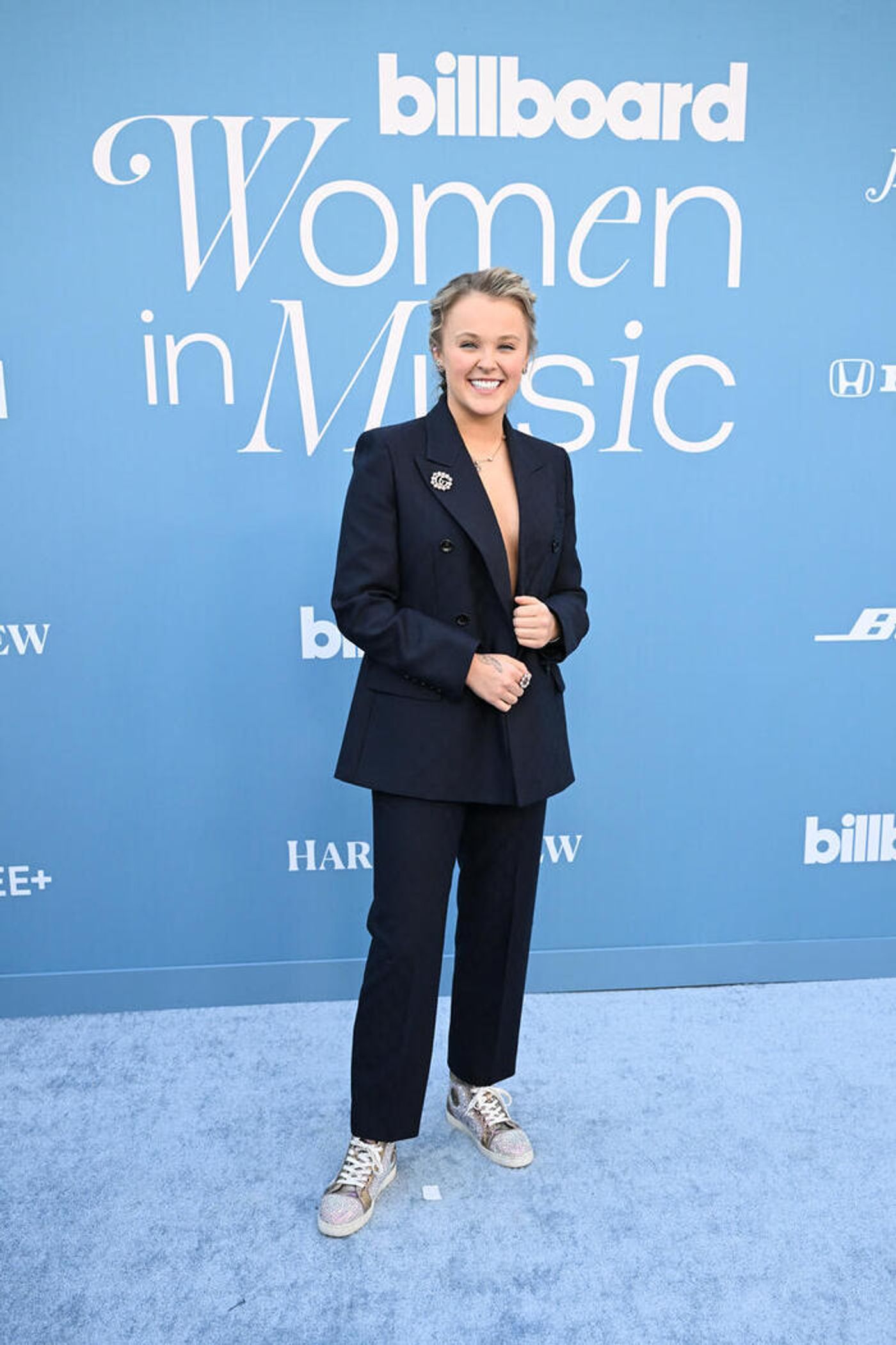Photos: Doechii, Laverne Cox, Meghan Trainor, & More Attend Billboard Women in Music 2025  Image