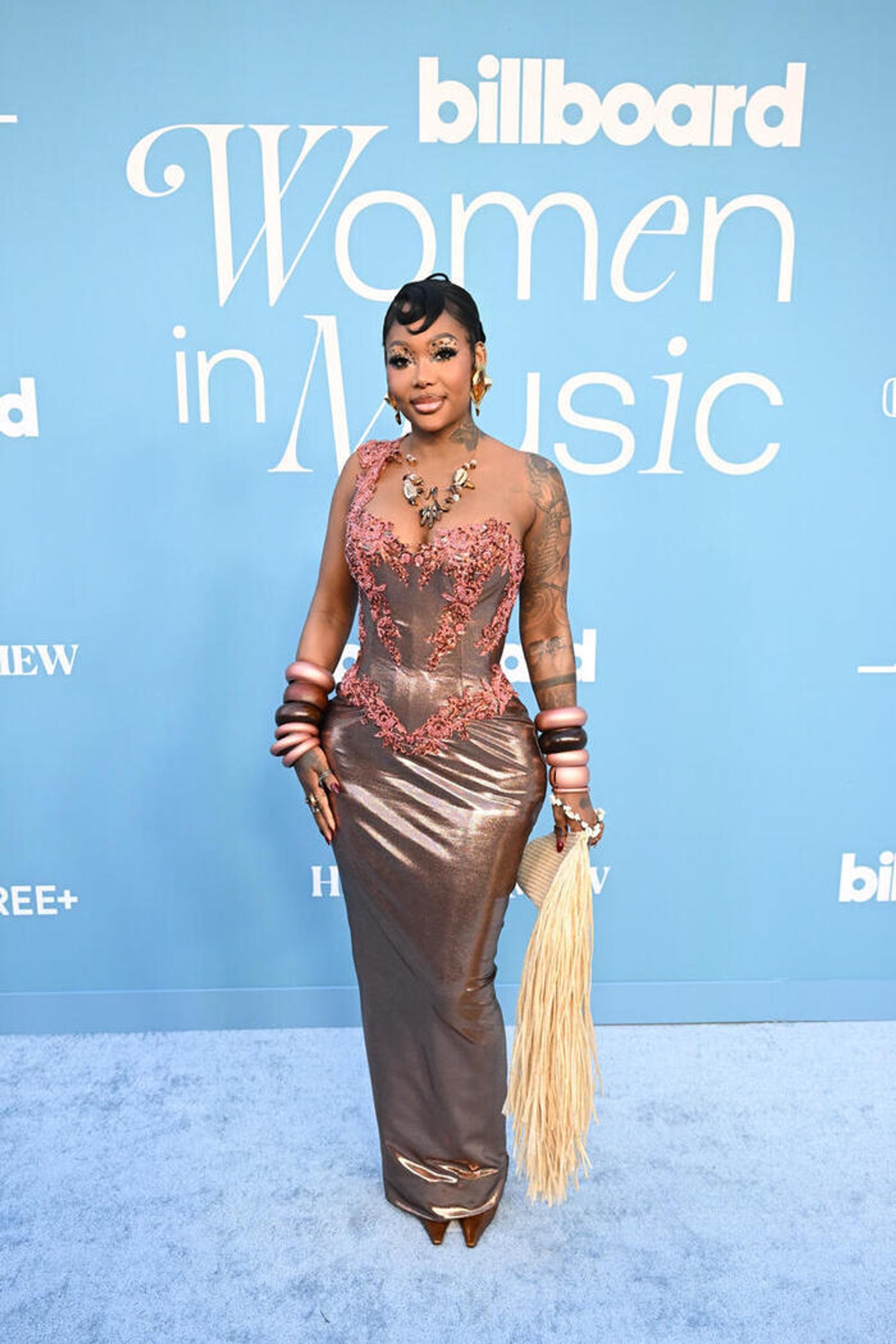 Photos: Doechii, Laverne Cox, Meghan Trainor, & More Attend Billboard Women in Music 2025  Image