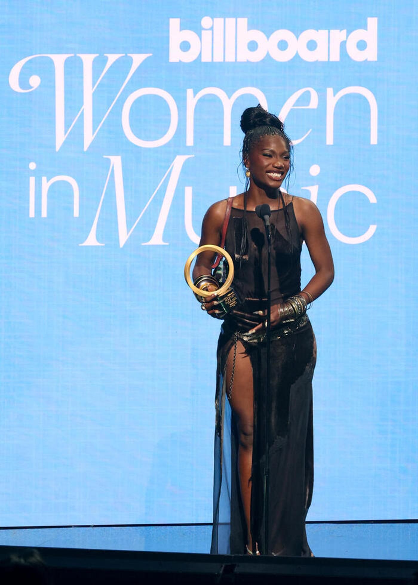 Photos: Doechii, Laverne Cox, Meghan Trainor, & More Attend Billboard Women in Music 2025  Image