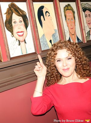 Bernadette Peters posing with Mary Tyler Moore's portrait @ BroadwayWorld Bernadette Peters posing with Mary Tyler Moore's portrait Photo