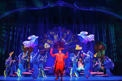 Kyle Parker Taylor (Sebastian), Hillary Fisher (Ariel), and ensemble Photo