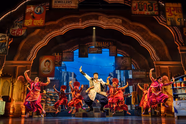 Ashley Day, Jena Pandya (Centre) & The Company Photo