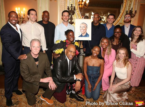 Denzel Washington poses with the company of 