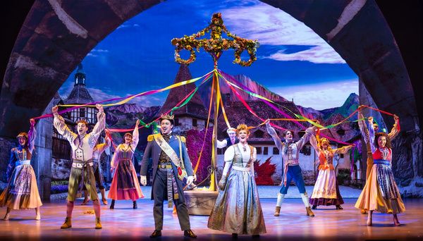 Gabriel Navarro and Ashley Moniz with the company of FROZEN Photo