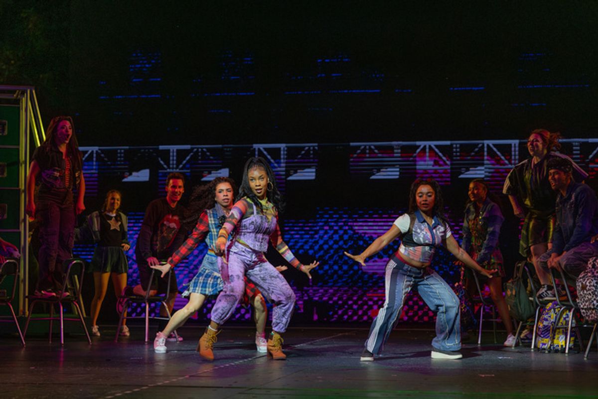 Kennedy Holmes and members of the company at 