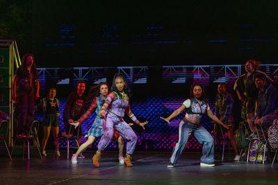 Kennedy Holmes and members of the company Photo