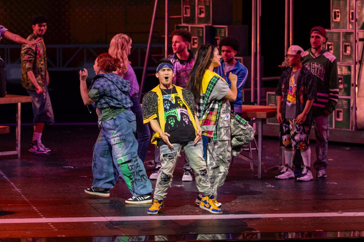 Kevin Trinio Perdido (center) and members of the company at 