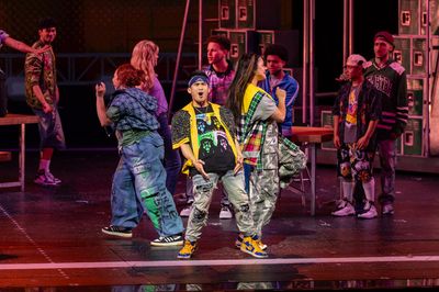 Kevin Trinio Perdido (center) and members of the company Photo