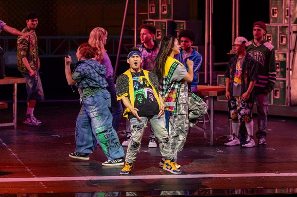 Kevin Trinio Perdido (center) and members of the company Photo