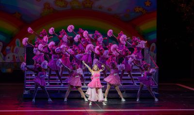 Taylor Sage Evans (center) and the company Photo