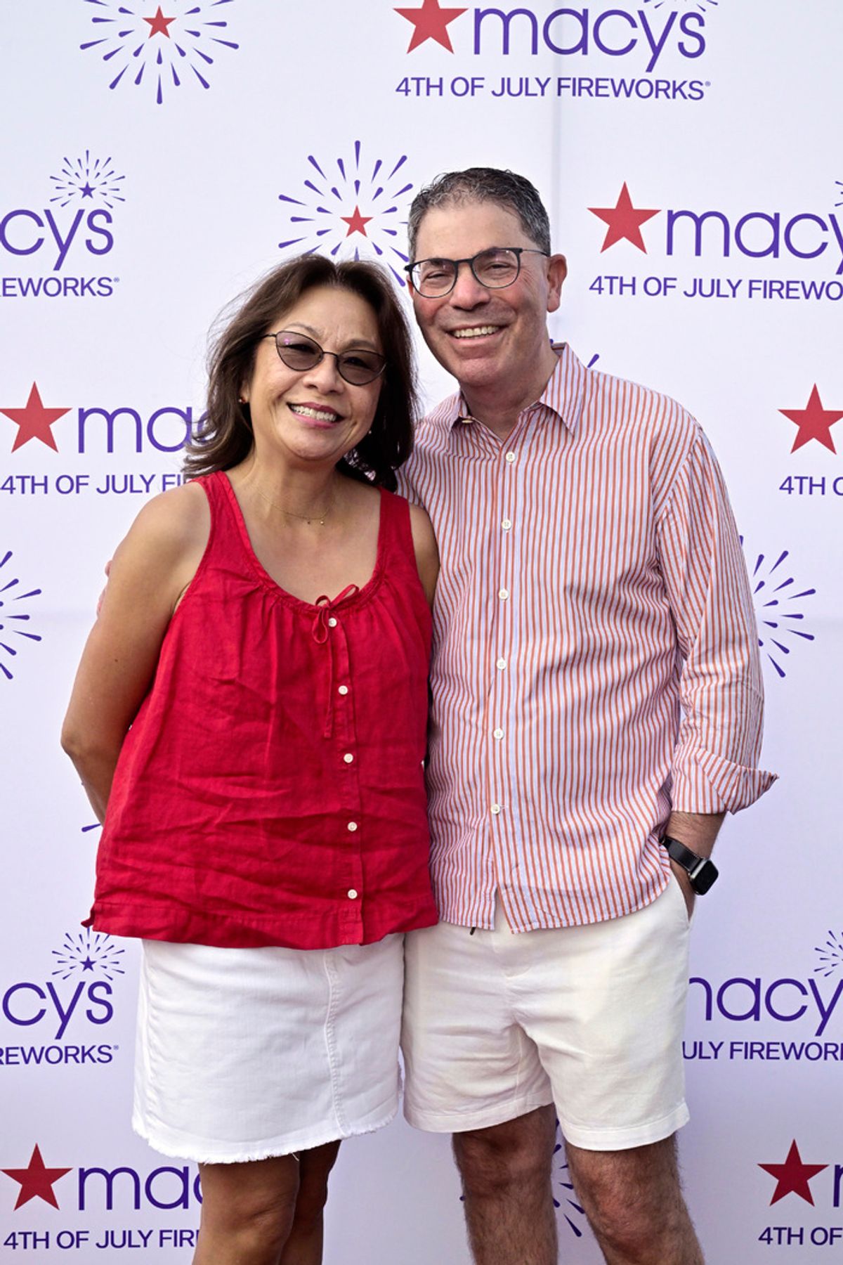 Tony Spring, Macy's, Inc. CEO (R) and guest  at 