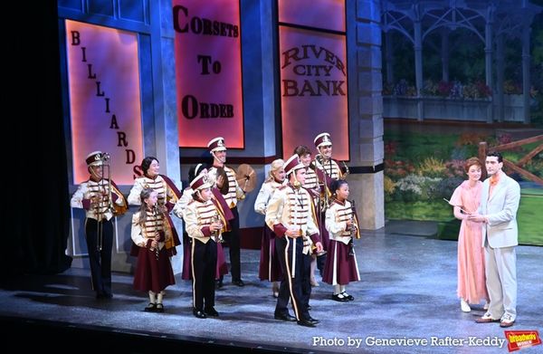 Elliott Litherland and Natalie Duncan with the cast of The Music Man Photo