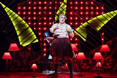 Michael Chioldi (Rigoletto), the Santa Fe Opera Chorus, photo by Curtis Brown for the Photo