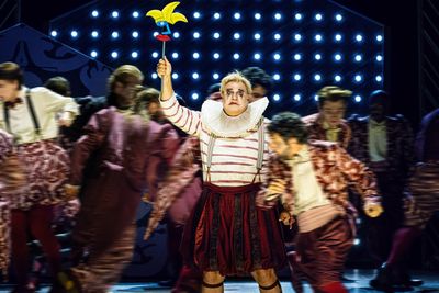 Michael Chioldi (Rigoletto), the Santa Fe Opera Chorus, photo by Curtis Brown for the Photo
