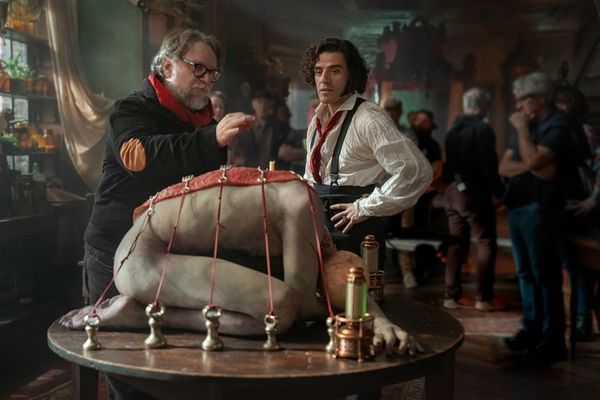 Director Guillermo del Toro and Oscar Issac Photo