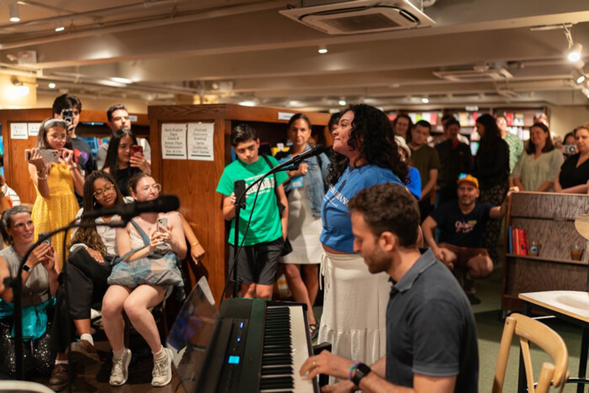 Tatianna Córdoba and Benjamin Velez performing a song from the show at 