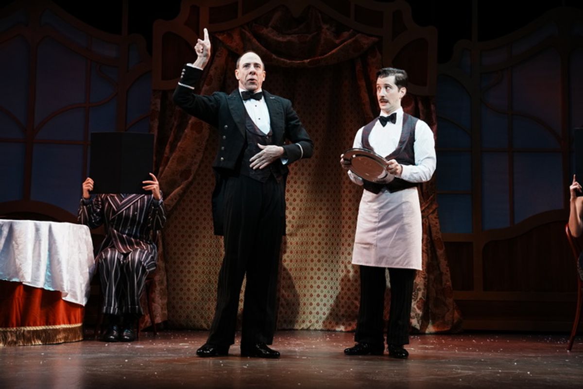 Patrick Richwood as Headwaiter and Nik Hagen as Busboy  at 