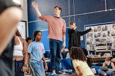 David Hunter (Center) and the company Photo