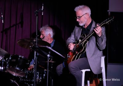 Sean Harkness on guitar. Photo credit: Conor Weiss Photo