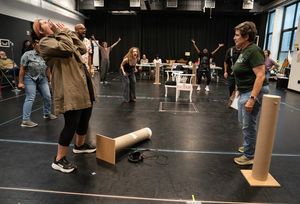 Ally Bonino and Ruth E. Sternberg (foreground) and the company  Photo