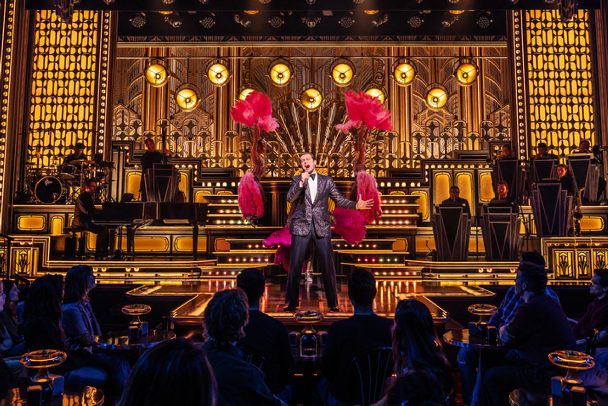 Jonathan Groff and the company at 