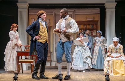 Adam KuveNiemann) speaks with actor Kwame (center right - Titus VanHook) as the other Photo