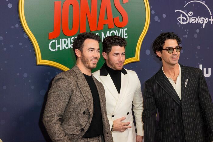 Photos: Adrienne Warren, Milo Manheim, & More at A VERY JONAS CHRISTMAS MOVIE Premiere Photos: Adrienne Warren, Milo Manheim, & More at A VERY JONAS CHRISTMAS MOVIE Premiere Image