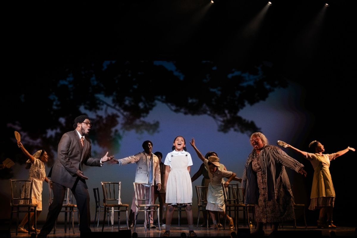 Auset Jones as Young Anna-Mae and the cast of TINA at 