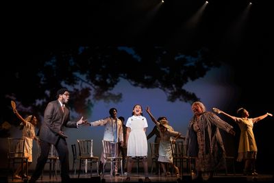 Auset Jones as Young Anna-Mae and the cast of TINA Photo