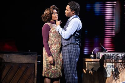 Darilyn Burtley as Tina and Lamar Burns as Raymond Photo