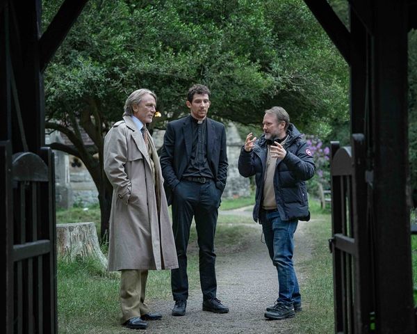 Daniel Craig, Josh O’Connor and writer/director Rian Johnson  Photo