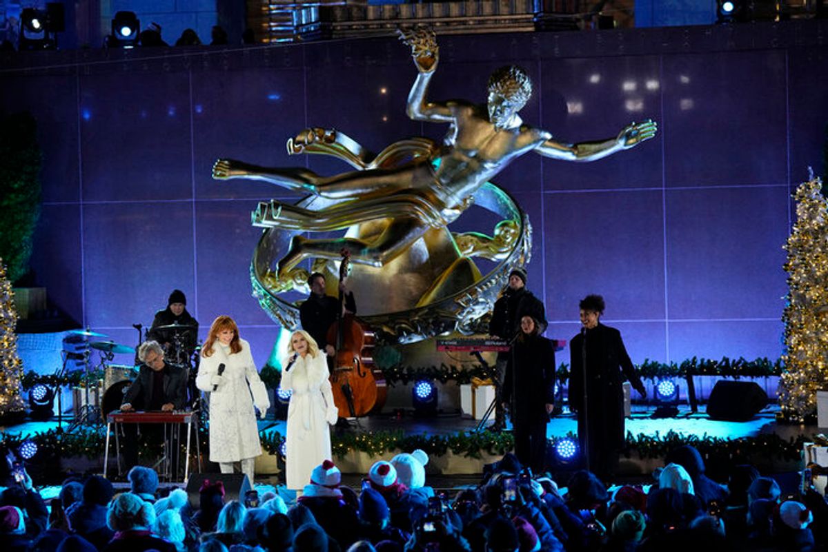 Host Reba McEntire, Kristin Chenoweth at 