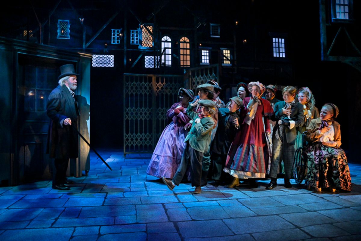 Michael Ray Wisely and the company of Center REP’s A Christmas Carol at 