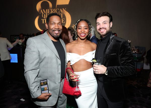 BEVERLY HILLS, CALIFORNIA - DECEMBER 15: (C-L) Tori Evans and TJ Shaw attend American Photo