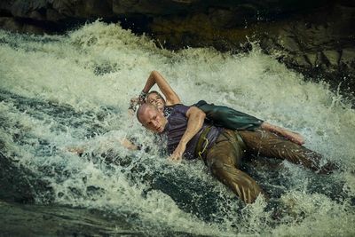 Taron Egerton and Charlize Theron Photo