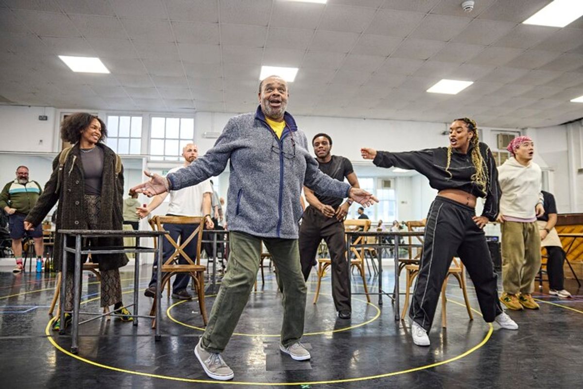 Clive Rowe and cast at 