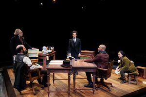 (from left) Andy Grotelueschen as The Lawyer, Matt Dallal as Turkey, Michael Crane as Bartleby, Devin E. Haqq as Nippers, and Myka Cue as Ginger Snap in Fiasco Theater’s Bartleby, 2026 @ BroadwayWorld (from left) Andy Grotelueschen as The Lawyer, Matt Dallal as Turkey, Michael Crane as Photo
