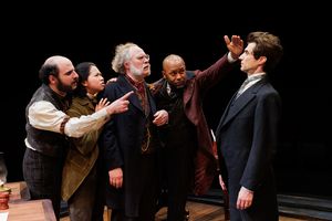 (from left) Matt Dallal as Turkey, Myka Cue as Ginger Snap, Andy Grotelueschen as The Lawyer, Devin E. Haqq as Nippers, and Michael Crane as
Bartleby in Fiasco Theater’s Bartleby, 2026 @ BroadwayWorld (from left) Matt Dallal as Turkey, Myka Cue as Ginger Snap, Andy Grotelueschen as The Photo