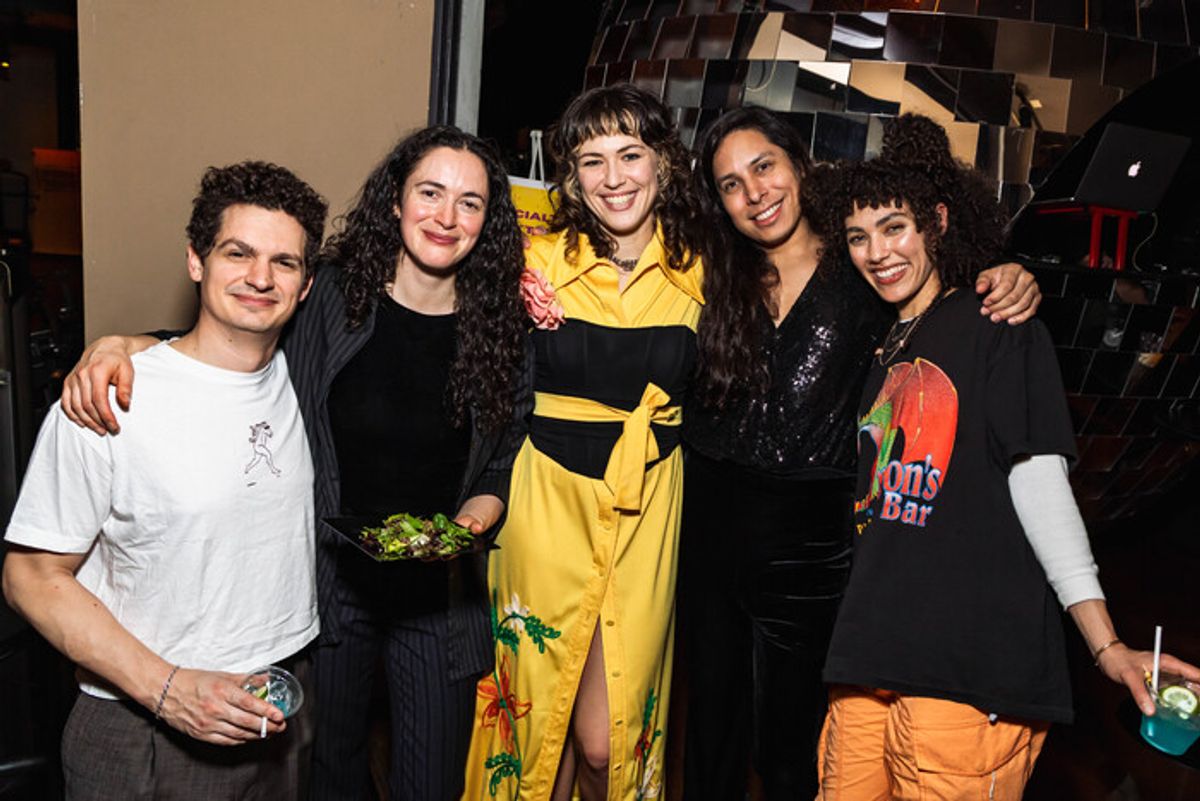 Ava Campbell and Claire Bird with designers and guests at 