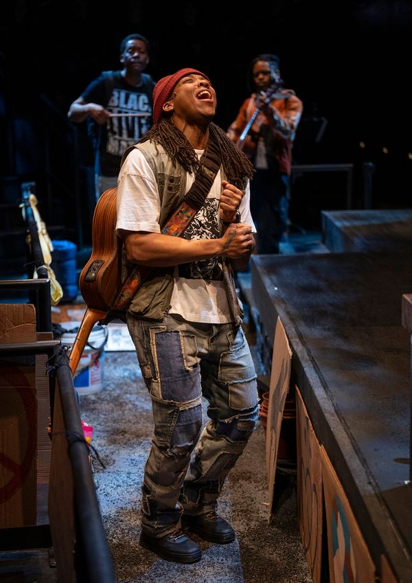 Esco Jouléy with (back, l to r)  Namir Smallwood and Jon Michael Hill  Photo