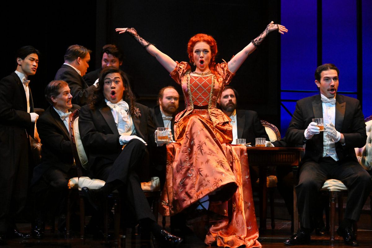 Michael Jesse Kuo, Joanne Evans, and the male ensemble  at 