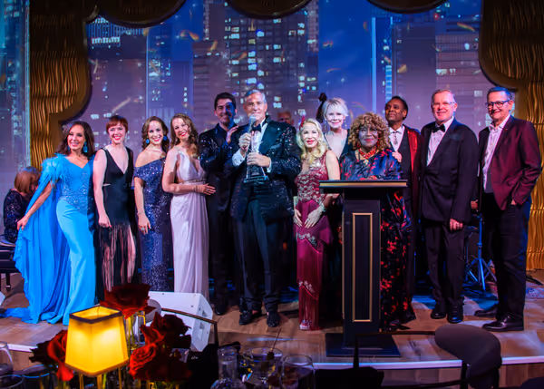 Rob Russell with performers Photo