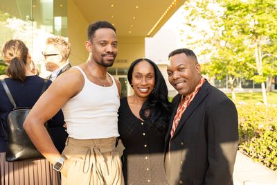Playwright Reggie D. White, NAACP Orange County Branch President Deirdre R. Harris an Photo