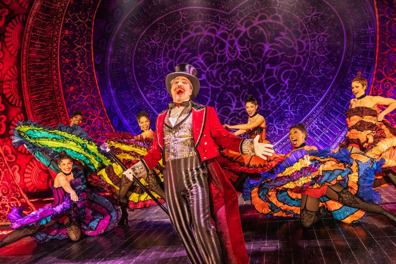Robert Petkoff and the Company of the 2025 touring production of MOULIN ROUGE! THE MUSICAL. Photo by Matthew Murphy and Evan Zimmerman for MurphyMade