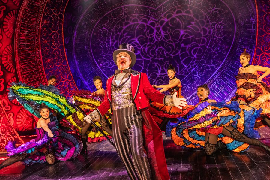Robert Petkoff and the Company of the 2025 touring production of MOULIN ROUGE! THE MUSICAL. Photo by Matthew Murphy and Evan Zimmerman for MurphyMade